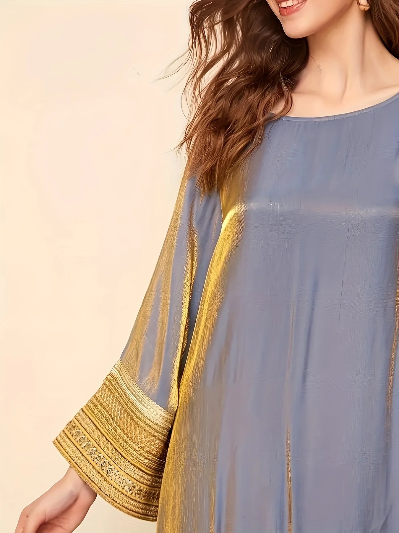 Abaya A Long Dress with a Round Neckline Featuring Directional Reflective Lace Decoration, Elegant Long Sleeves, And a Loose Fit--Color: Gold